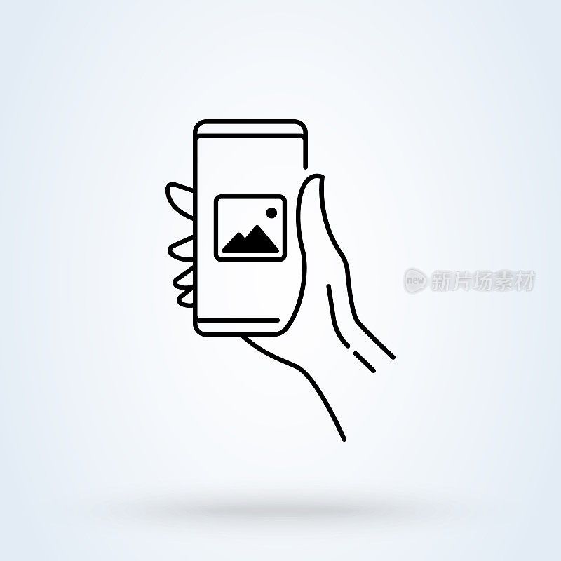 Hand holding smartphone with photos sign line icon or logo. Photo gallery on mobile phone concept. Multimedia, photo album app vector linear illustration.